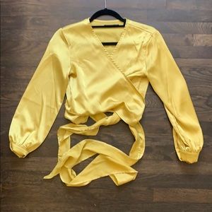 Yellow gold satin wrap top. Size 2. new no tags